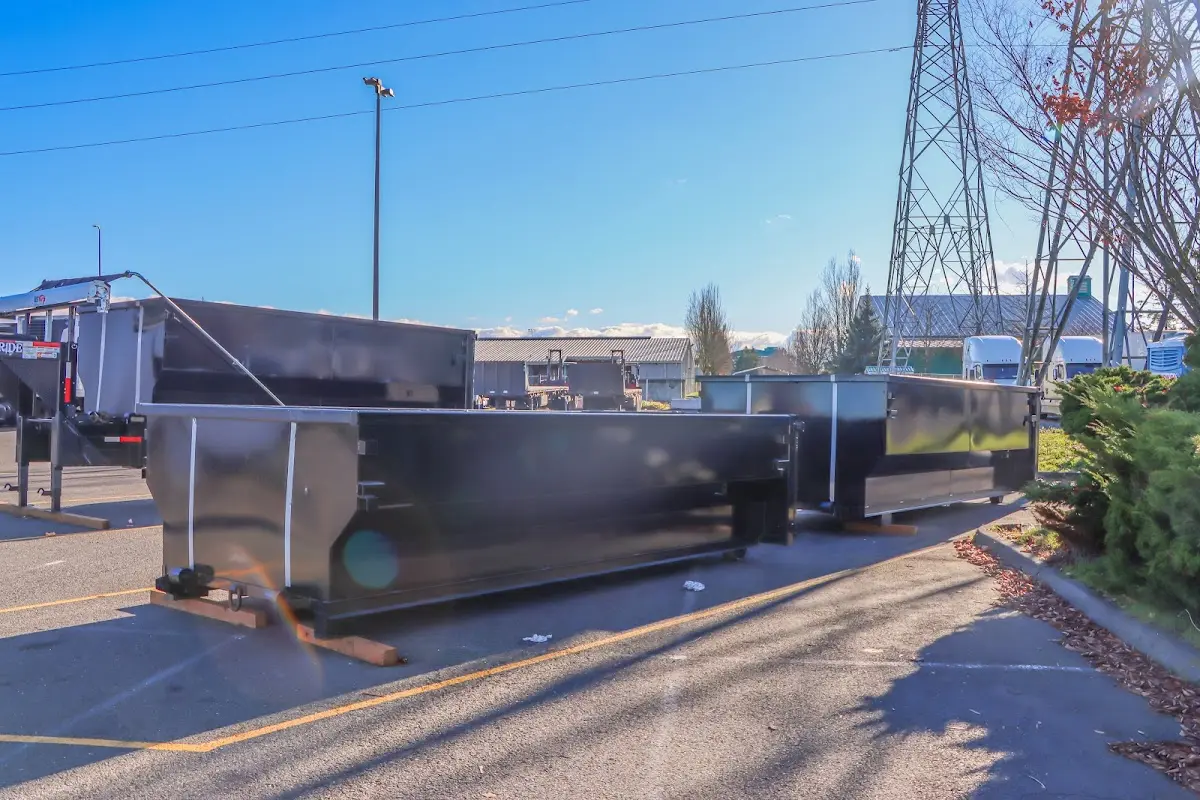 Roll-off dumpster ready for waste disposal at job site for 15 Yard Dumpster Rental in Whitefish